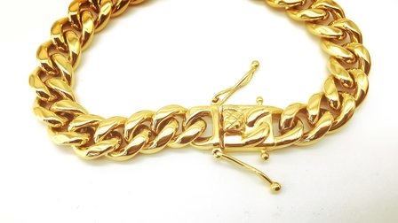 Stalen goudkleurige gourmet schakelketting armband. L 18 cm