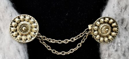 Clips met dubbel ketting Zeeuwse knoop goudkleurig.