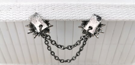 Clips met dubbel ketting, Edelweiss in zilverkleur.