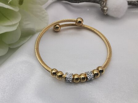 Flexibles Twisted-Armband aus Edelstahl in Goldfarbe mit Strasselementen