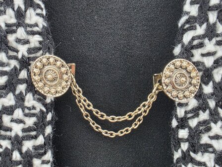 Clips met dubbel ketting Zeeuwse knoop goudkleurig.