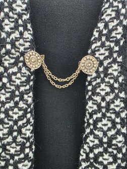 Clips met dubbel ketting Zeeuwse knoop goudkleurig.