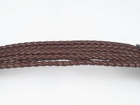 Armband aus PU-Leder &ndash; 7 geflochtene B&auml;nder mit Druckknopfverschluss