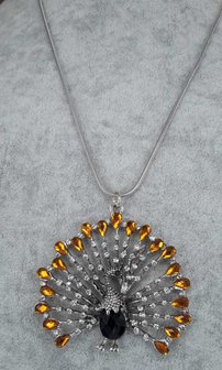 pomp&ouml;se Pfau, wei&szlig;er Strass, orange Strass tropfen