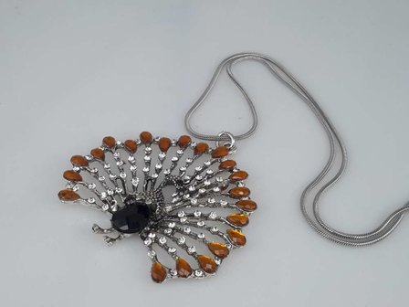 pomp&ouml;se Pfau, wei&szlig;er Strass, orange Strass tropfen