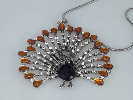 pomp&ouml;se Pfau, wei&szlig;er Strass, orange Strass tropfen