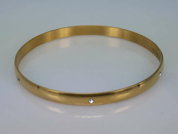 Edelstahl Slave Armband breit Goldfarbe mit 6 Kristall um ihn herum.