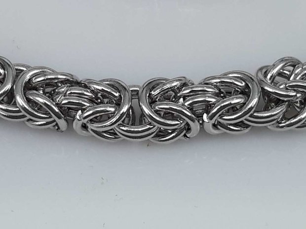 Edelstaal zilverkleurig Armband 22 cm, motief Draak rond dubbel schakel.