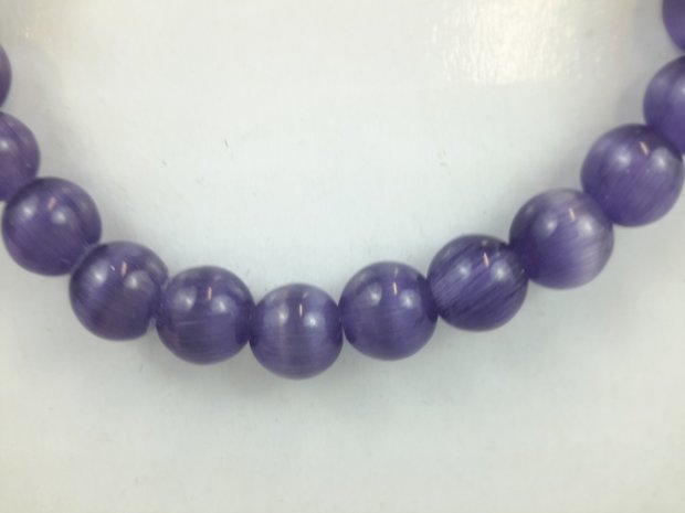 Armband katze-auge, violett, 23 Perle