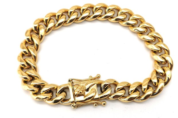 Stalen goudkleurige gourmet schakelketting armband. L 20 cm