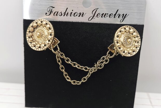 Clips met dubbel ketting Zeeuwse knoop goudkleurig.