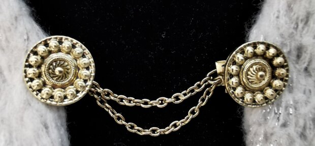 Clips met dubbel ketting Zeeuwse knoop goudkleurig.