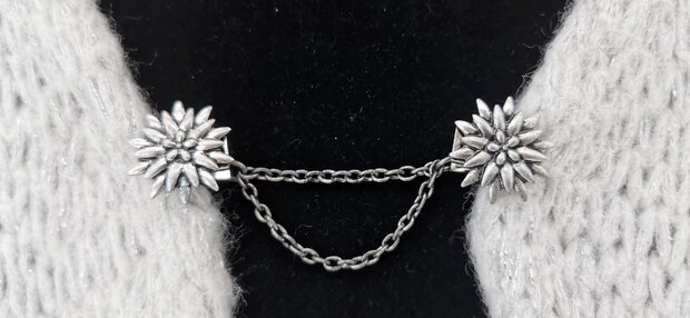 Clips met dubbel ketting, Edelweiss in zilverkleur.