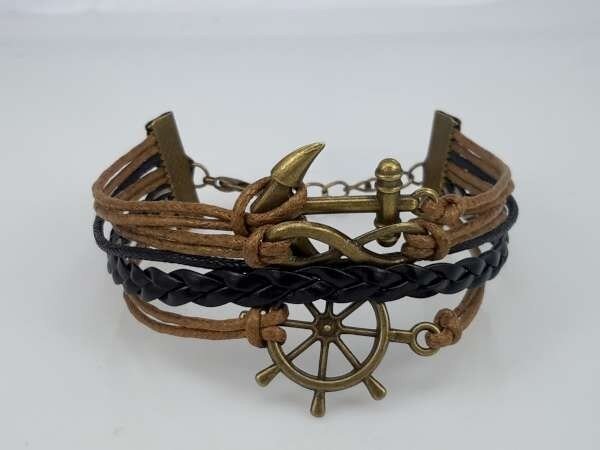 Armband, lichtbruin, zwarte vlecht, anker, scheepsstuur, krul