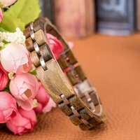 Armband zebrano houten - 22 cm - RVS tussenschakels zilverkleurig.