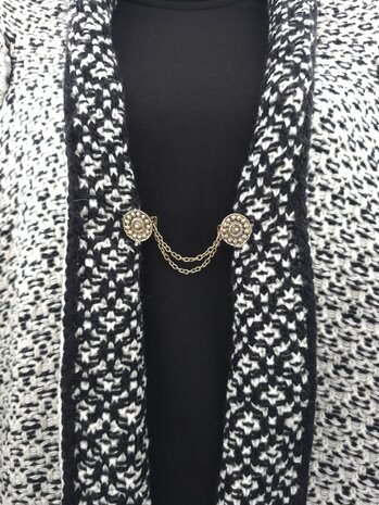 Clips met dubbel ketting Zeeuwse knoop goudkleurig.