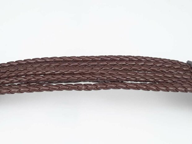 Armband aus PU-Leder &ndash; 7 geflochtene B&auml;nder mit Druckknopfverschluss