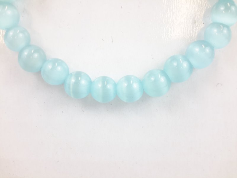 Armband kattenoog, aquablauw, 23 kralen