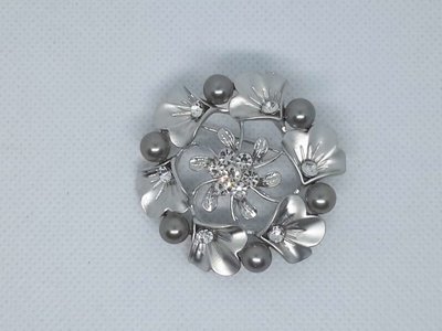 Broche ronde bloemslinger, antraciete Parels, strass